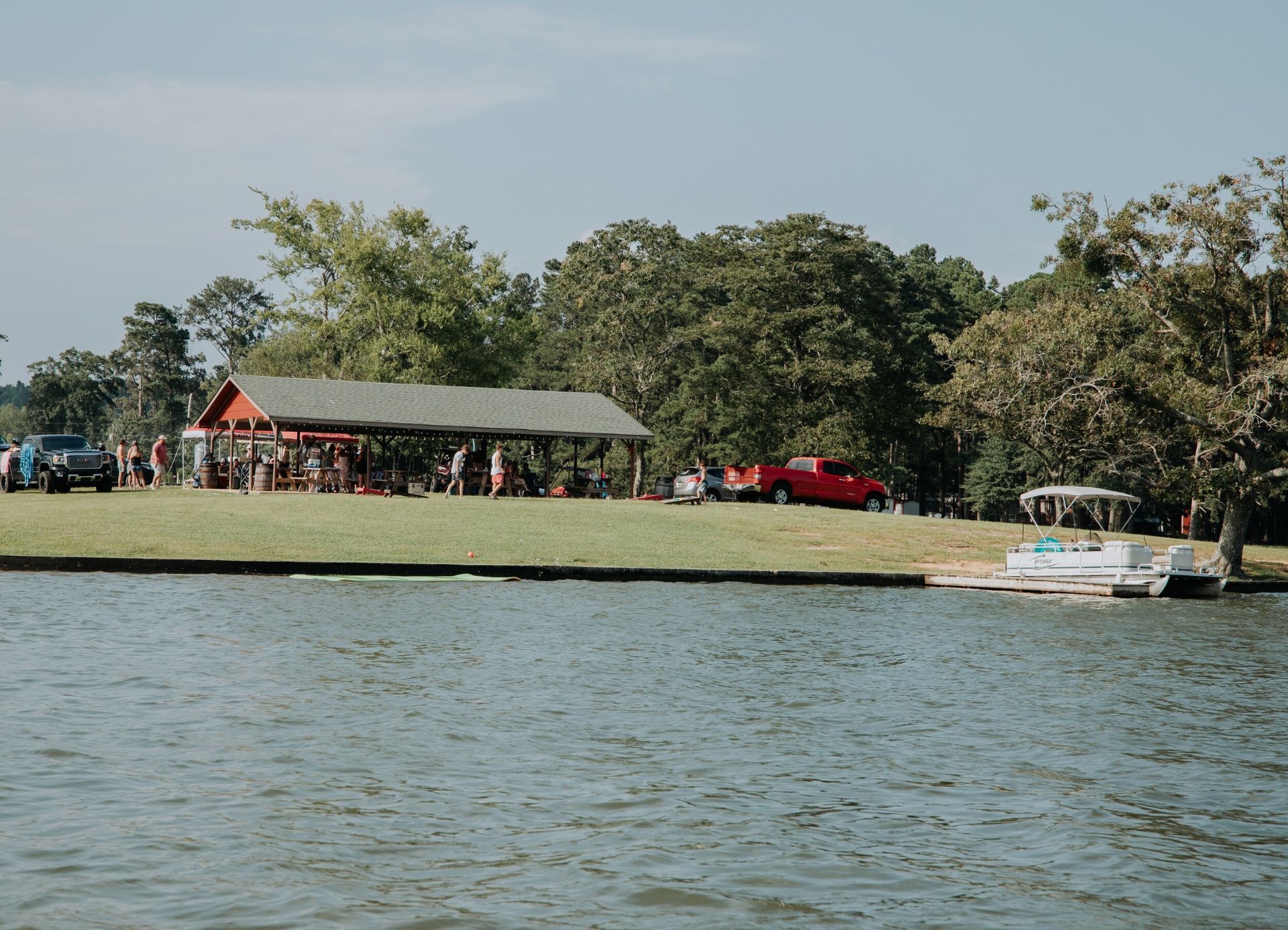Waterfront pavilion and pontoon dock on a sunny day