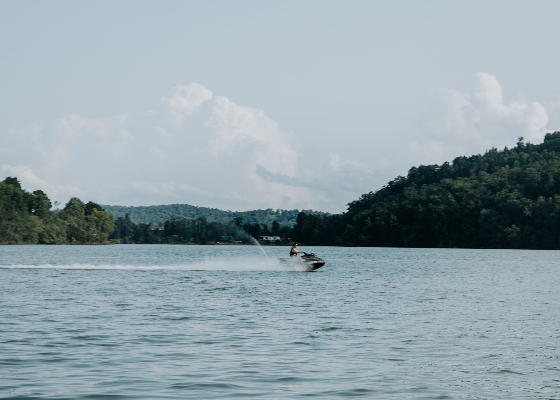 Jet ski speeding across Neely Henry Lake